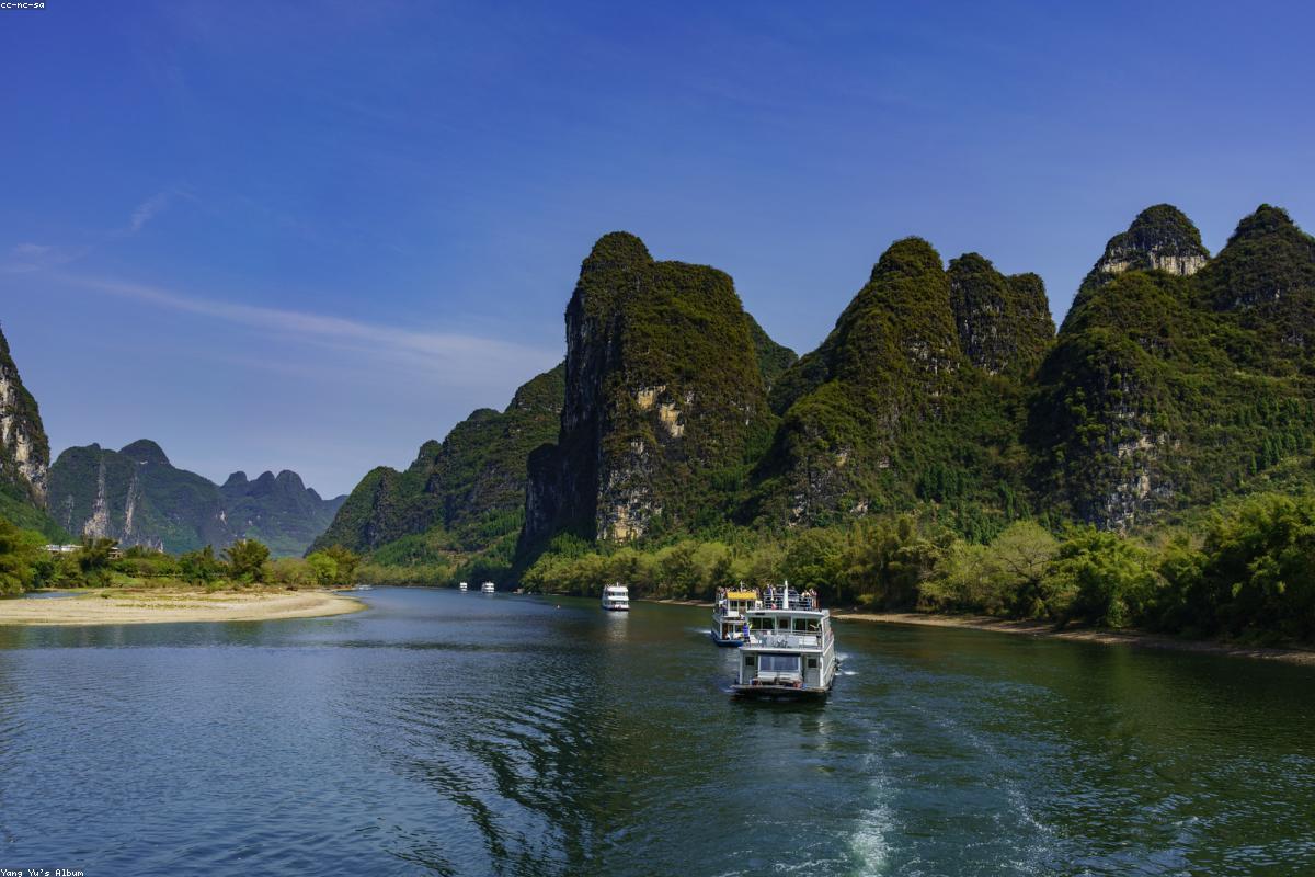 The karst peaks of Guilin are reflected in the clear waters of the Li River